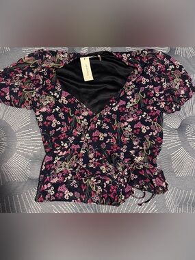 Francesca's Navy Satin shirt with Pink Floral Trim